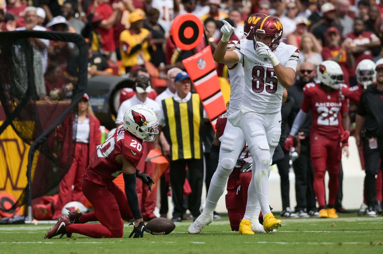 Washington Commanders tight end Cole Turner (85) reacts after catching a pass form first down during the first half against the Arizona Cardinals at FedExField.